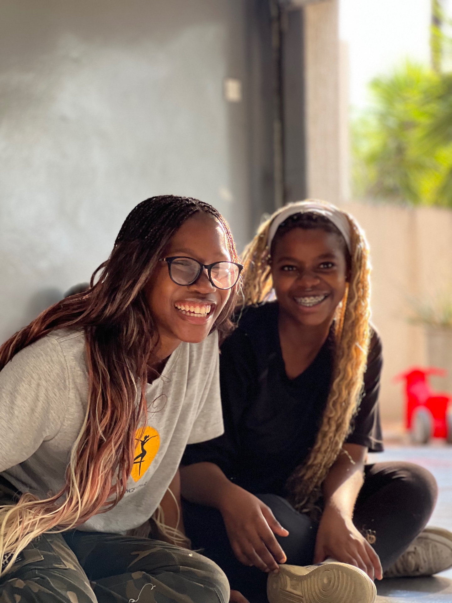 The Dance Space founder and a student smiling together at the studio
